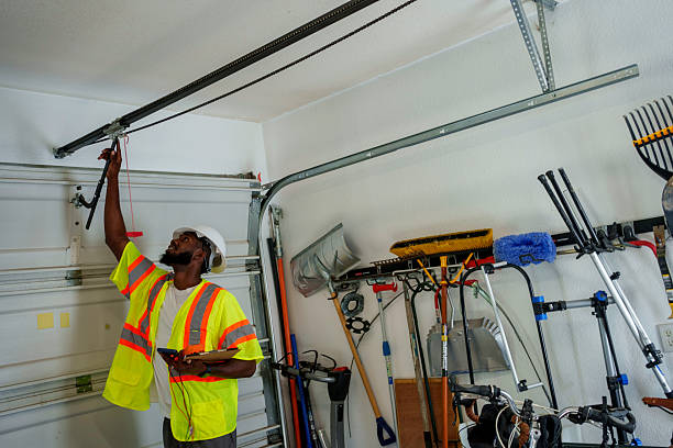 Professional Garage Door Installation technician working in East Setauket, NY